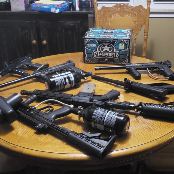 Six paintball guns and box of paintballs. - Picture 1 of 4